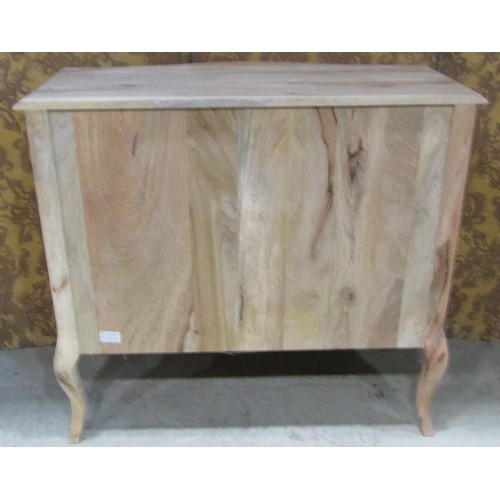 1161 - A hard  wood serpentine chest of three drawers on shaped supports, 100cm wide