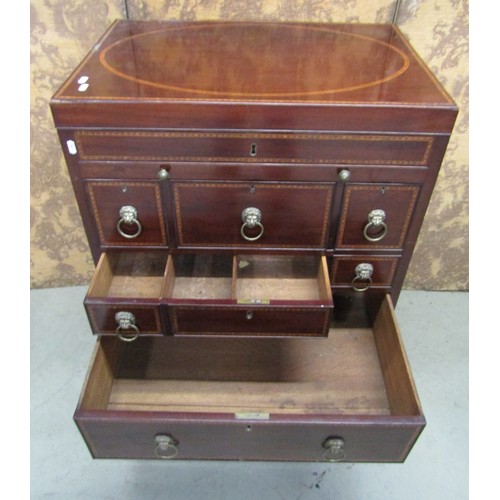 1197 - A Georgian mahogany gentleman's wash stand with rising lid, with comprehensively fitted interior, in... 