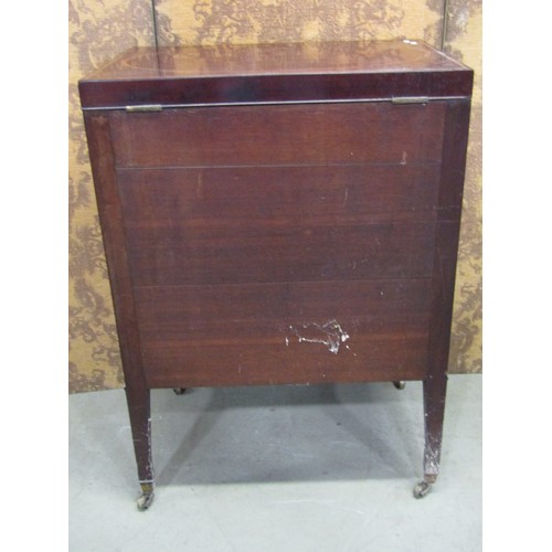 1197 - A Georgian mahogany gentleman's wash stand with rising lid, with comprehensively fitted interior, in... 