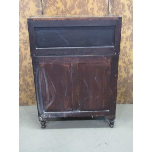 1201 - A Regency mahogany Chiffonier enclosed by two brass grilled doors beneath a raised and shaped back 7... 