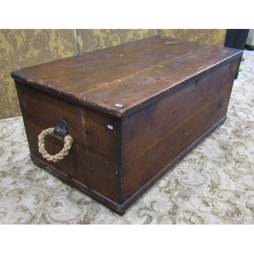 1154 - A Victorian large stained pine seaman's  chest with hinged lid and rope twist side carrying handles,... 