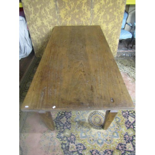 1155 - An Old English style oak farmhouse table, the plank top with moulded borders, raised on four square ... 