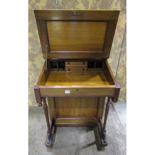 1162 - A late Victorian mahogany davenport with raised triple bevelled edge mirror back over the usual arra... 