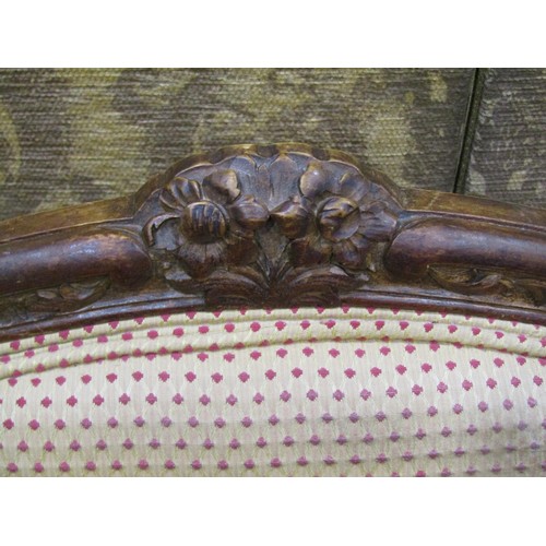 1223 - A pair of upholstered armchairs with carved show wood frames on cabriole supports