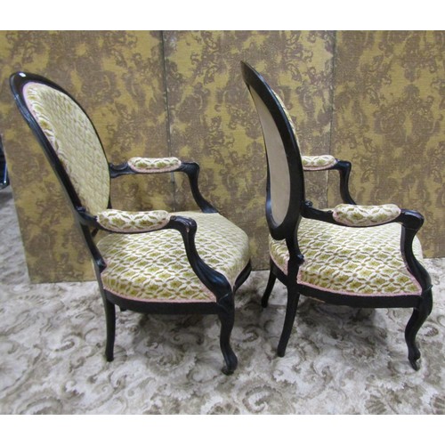 1231 - A pair of Victorian drawing room chairs with cameo back, upholstered finish