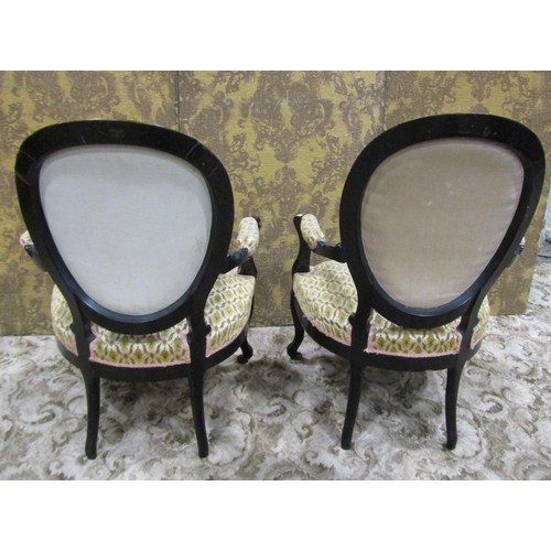 1231 - A pair of Victorian drawing room chairs with cameo back, upholstered finish