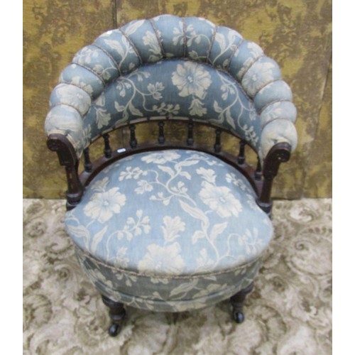 1233 - A Victorian tub chair with carved spindle mouldings and swivel framework, probably marine