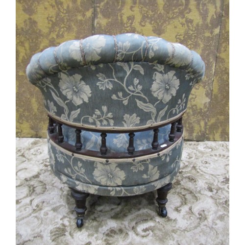 1233 - A Victorian tub chair with carved spindle mouldings and swivel framework, probably marine