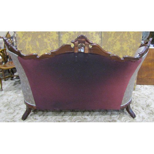 1253 - A high back mahogany sofa with carved showwood frame on cabriole supports, 180cm long