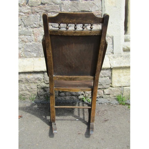 1228 - A cane back Jacobean style chair, together with a rocking chair and small footstool