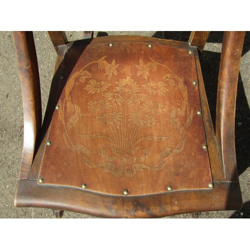 1228 - A cane back Jacobean style chair, together with a rocking chair and small footstool