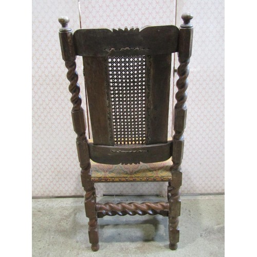 1228 - A cane back Jacobean style chair, together with a rocking chair and small footstool