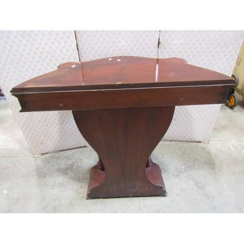 1149 - A mahogany console table on shaped supports, 93cm wide