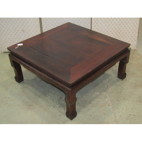 1130 - A Chinese hard wood low occasional table, 74cm square, 35cm high