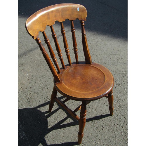 1219 - A set of seven (6+1) Windsor kitchen chairs with turned spindle backs and circular dish seats