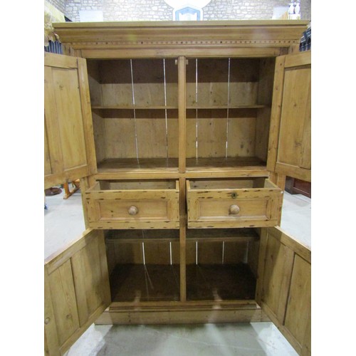 1156 - A 19th century stripped and waxed pine food cupboard of full height enclosed by two pairs of panelle... 