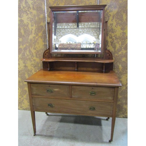 1169 - Three piece Art Nouveau bedroom suite comprising wardrobe, dressing chest and washstand, all with fl... 