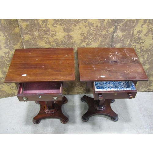 1168 - Two similar pedestal tables, each enclosing a single drawer on platform bases