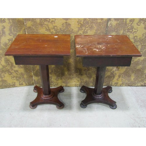 1168 - Two similar pedestal tables, each enclosing a single drawer on platform bases