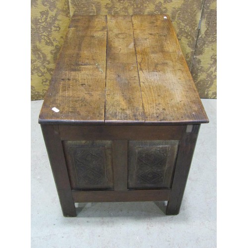 1175 - A small old English style oak coffer with carved and panelled framework, 88cm wide