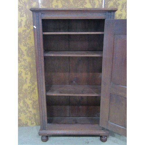 1158 - An old English style carved oak side cupboard in the Elizabethan style with panelled framework and s... 