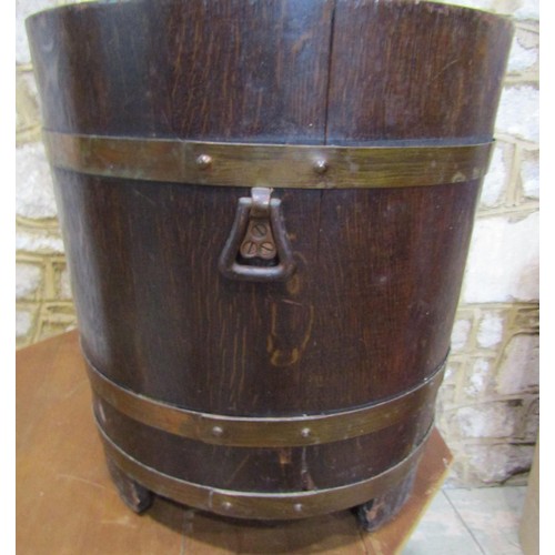 1114 - A Lister oak and brass banded floor standing tub