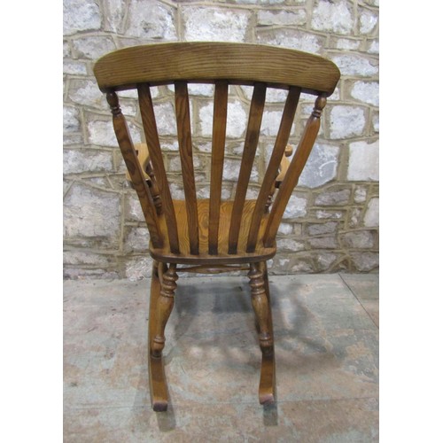 1119 - A Windsor lathe back rocking chair, principally in ashwood