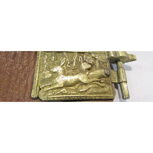 575 - A Leather hunting belt, in three sections with gilded metal links each decorated with hunting scenes... 