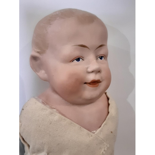 871 - 4 early 20th century bisque head dolls including a shoulder head 'Kaiser Baby' type character boy do... 