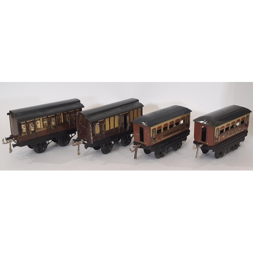 872 - A collection of pre war Hornby 0 gauge railway models including the following: clockwork locomotive ... 