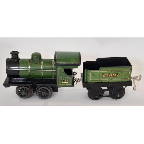 872 - A collection of pre war Hornby 0 gauge railway models including the following: clockwork locomotive ... 