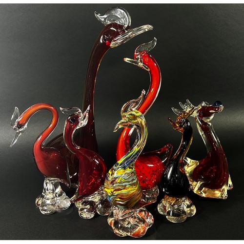 99 - A collection of twelve Murano glass animals including a blue nosed reindeer, fish, ducks, a cockerel... 