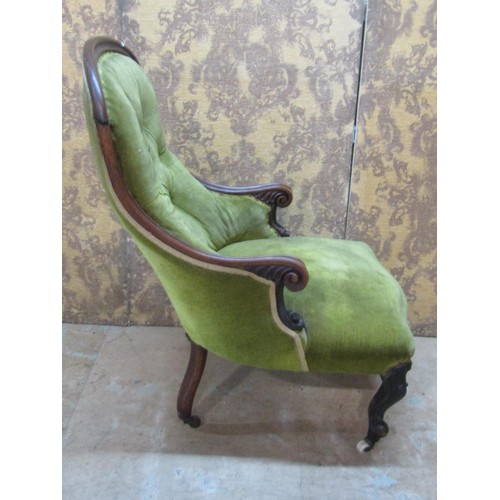 1321 - A Victorian drawing room chair with upholstered seat and button back with a shaped carved and moulde... 