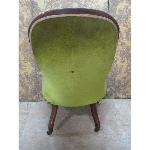 1321 - A Victorian drawing room chair with upholstered seat and button back with a shaped carved and moulde... 