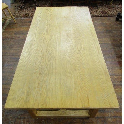 1339 - A contemporary ash wood farmhouse dining table with heavy plank top, raised on four square cut suppo... 