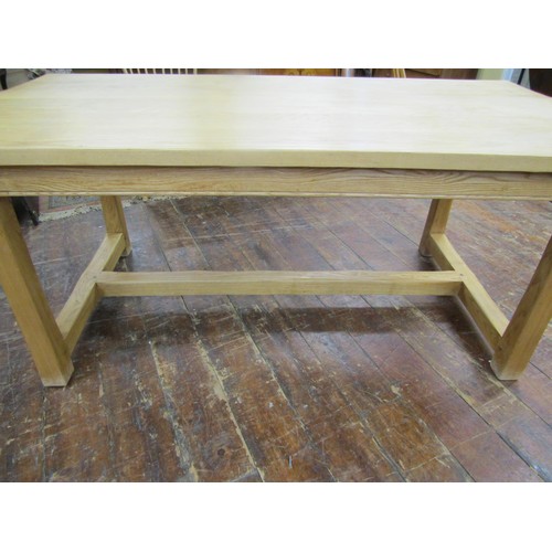 1339 - A contemporary ash wood farmhouse dining table with heavy plank top, raised on four square cut suppo... 