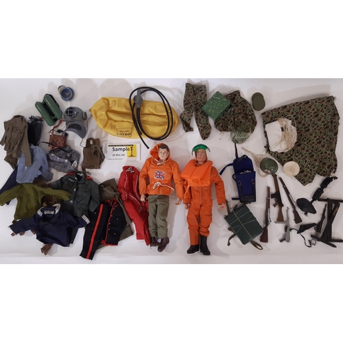 883 - Two GI Joe dolls by Hasbro ©1964 together with a large quantity of unsorted clothing, diving and mil... 