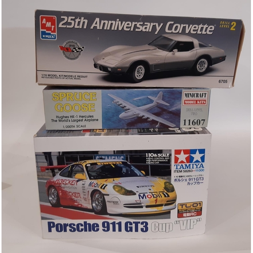 898 - 3 vintage boxed model kits comprising '57 Corvette by MPC, 1978 25th Anniversary Corvette by AMT/ERT... 