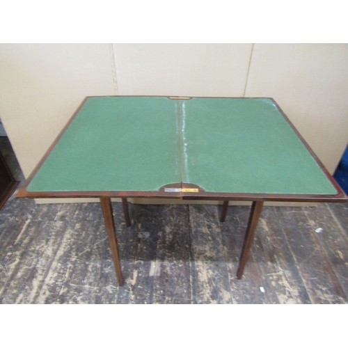 1349 - An inlaid Edwardian mahogany foldover top card table on square tapered legs, with satin wood string ... 