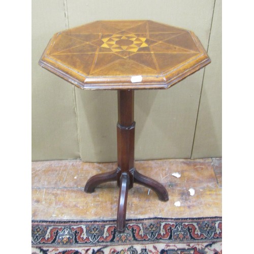 1359 - A Victorian walnut occasional table, the octagonal top with inlaid marquetry detail, raised on a cha... 