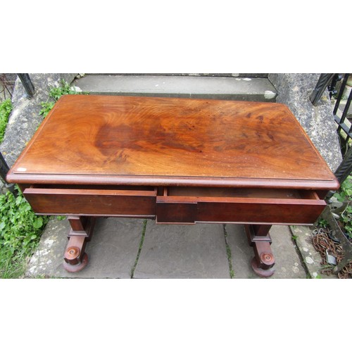 1361 - A Victorian mahogany side table enclosing two frieze drawers raised on a stretcher base with central... 