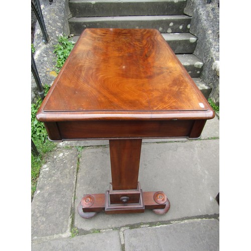 1361 - A Victorian mahogany side table enclosing two frieze drawers raised on a stretcher base with central... 