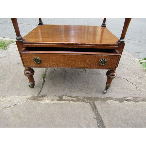 1365 - Early 19th century three tier whatnot on turned supports incorporating a lower frieze drawer on turn... 