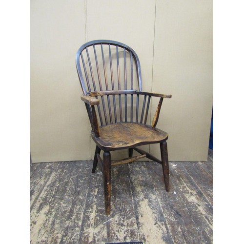 1376 - Two 19th century Windsor comb-back elbow chairs, in elm and beech (2)