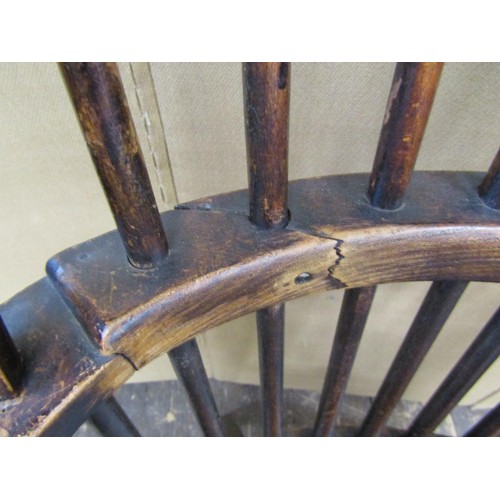 1376 - Two 19th century Windsor comb-back elbow chairs, in elm and beech (2)