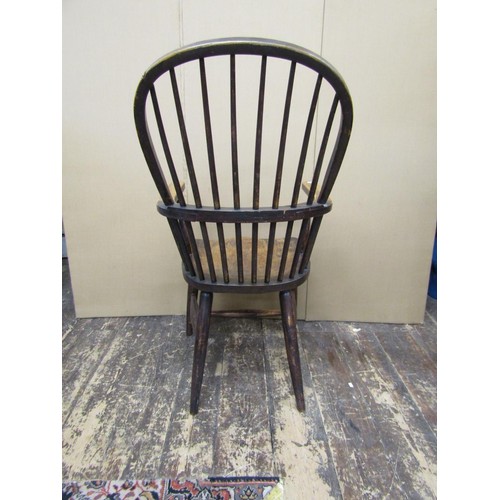 1376 - Two 19th century Windsor comb-back elbow chairs, in elm and beech (2)