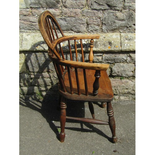 1377 - Early 19th century Windsor comb back elbow chair with shaped and pierced splat, principally in ash w... 