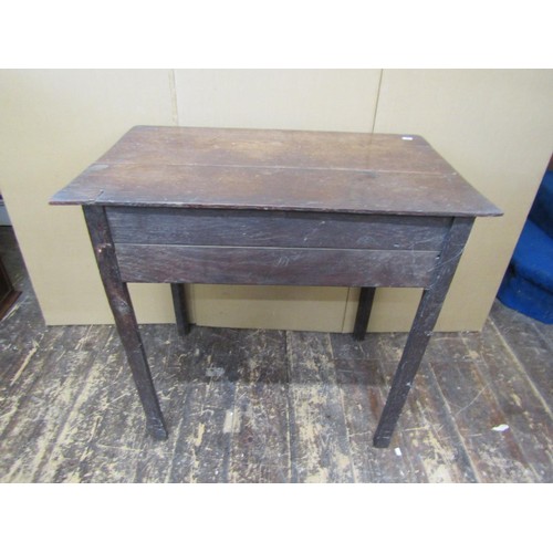 1386 - A Georgian oak country made side table with frieze drawer, crossbanded in walnut with shaped apron o... 