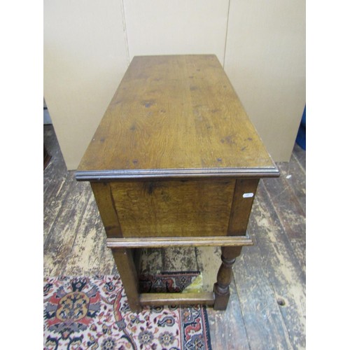 1395 - A good quality contemporary Georgian style side table incorporating three drawers on turned supports... 