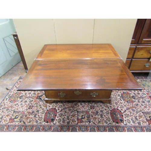 1396 - An antique mahogany chest of four drawers with bracket supports, set beneath a foldover top, 100cm w... 